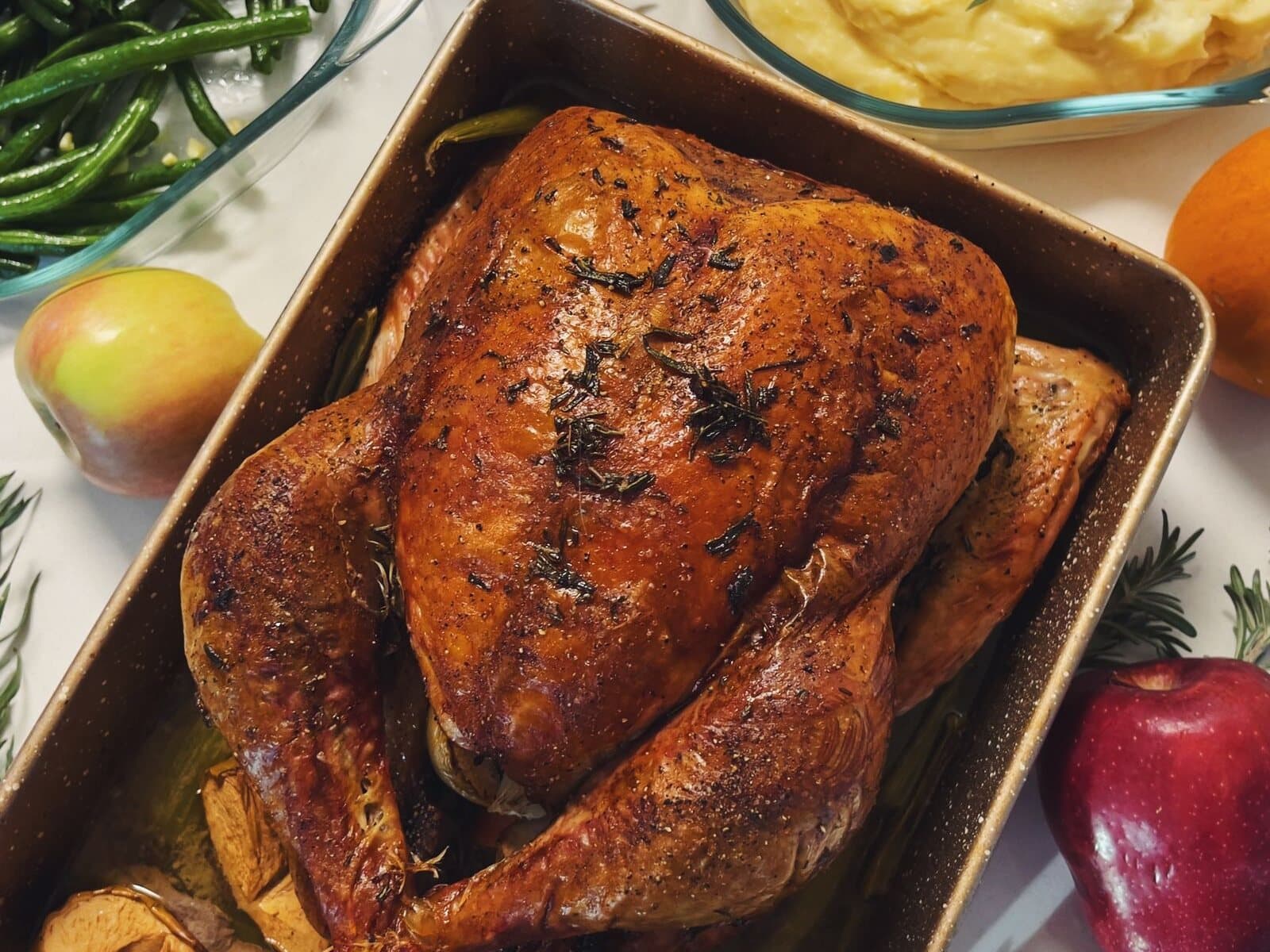 Roasted turkey with green beans, mashed potatoes and autumn garnishes